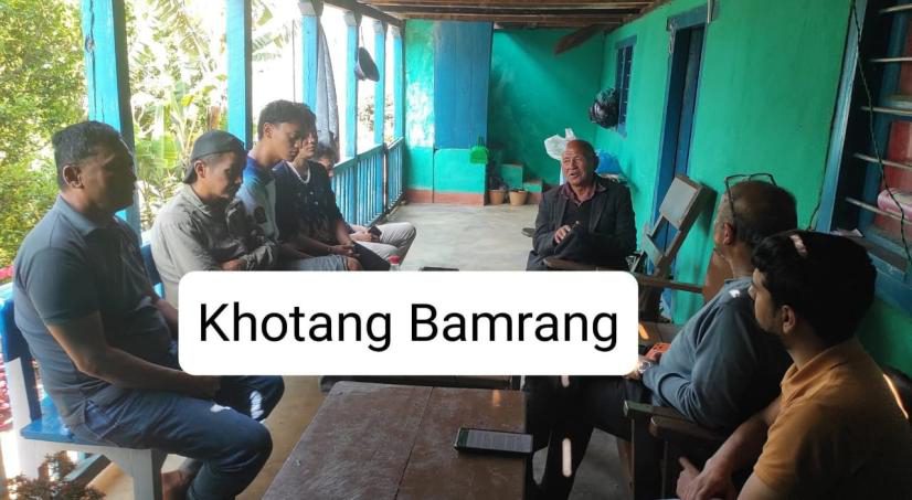 A missionary team sharing the Gospel in a home in Khotang