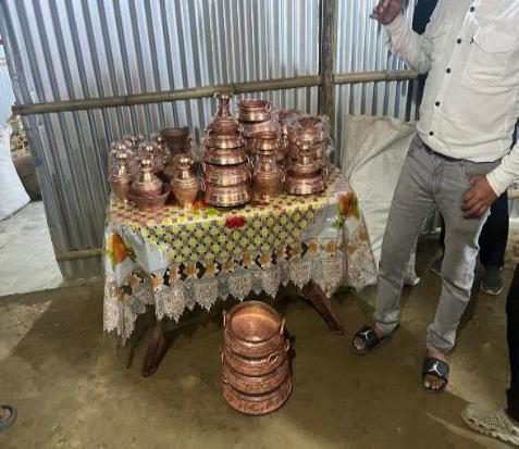 A pastor's metal utensil business started through a TODA micro-loan